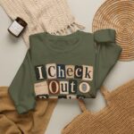 I Check Out Books & Cold Cases Crewneck Sweatshirt — Cozy True Crime Booklover Pullover