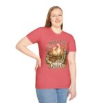T-Shirt — "Soft Life, Loud Quacks" Cute Duck Graphic Tee one dramatic duck standing in shallow pond water with cattails, ripples, reeds, and a slightly judgmental expression. Give the duck a...