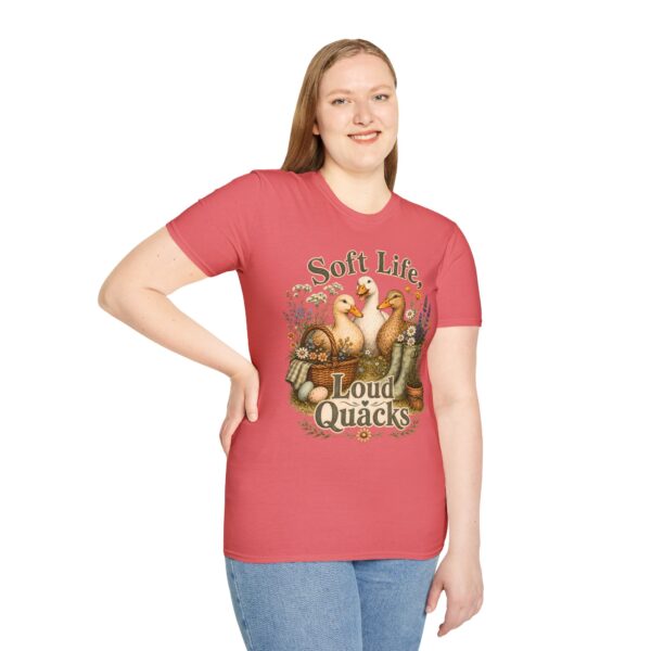 T-Shirt — "Soft Life, Loud Quacks" Cute Duck Graphic Tee one dramatic duck standing in shallow pond water with cattails, ripples, reeds, and a slightly judgmental expression. Give the duck a...