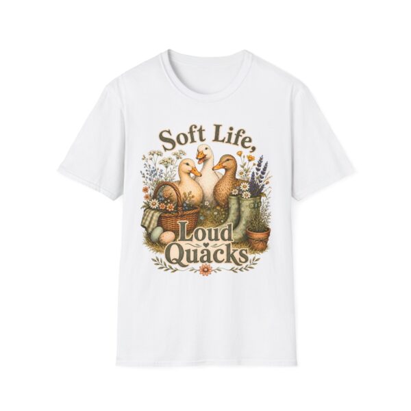 T-Shirt — "Soft Life, Loud Quacks" Cute Duck Graphic Tee one dramatic duck standing in shallow pond water with cattails, ripples, reeds, and a slightly judgmental expression. Give the duck a...