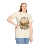 T-Shirt — "Soft Life, Loud Quacks" Cute Duck Graphic Tee one dramatic duck standing in shallow pond water with cattails, ripples, reeds, and a slightly judgmental expression. Give the duck a...