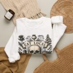 Eat Local Stay Cautious skull illustration Sweatshirt | botanical apothecary design