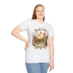 T-Shirt — "Soft Life, Loud Quacks" Cute Duck Graphic Tee one dramatic duck standing in shallow pond water with cattails, ripples, reeds, and a slightly judgmental expression. Give the duck a...