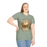 T-Shirt — "Soft Life, Loud Quacks" Cute Duck Graphic Tee one dramatic duck standing in shallow pond water with cattails, ripples, reeds, and a slightly judgmental expression. Give the duck a...