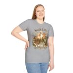 T-Shirt — "Soft Life, Loud Quacks" Cute Duck Graphic Tee one dramatic duck standing in shallow pond water with cattails, ripples, reeds, and a slightly judgmental expression. Give the duck a...