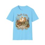 T-Shirt — "Soft Life, Loud Quacks" Cute Duck Graphic Tee one dramatic duck standing in shallow pond water with cattails, ripples, reeds, and a slightly judgmental expression. Give the duck a...