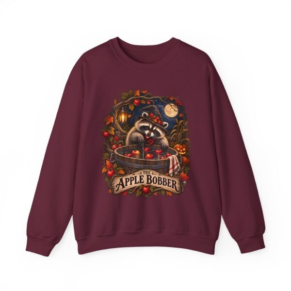 Crewneck Sweatshirt — "The Apple Bobber" Halloween Raccoon Apple-Bobbing Design