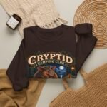 Cryptid Camping Club Sweatshirt — 'We Share the Campsite Now' Cozy Crewneck