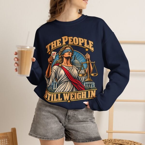Crewneck Sweatshirt — "The People Still Weigh In" Lady Justice Graphic