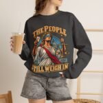 Crewneck Sweatshirt — "The People Still Weigh In" Lady Justice Graphic