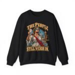 Crewneck Sweatshirt — "The People Still Weigh In" Lady Justice Graphic